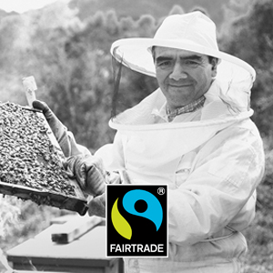 Fairtrade Imker mit Rähmchen und Fairtrade Logo